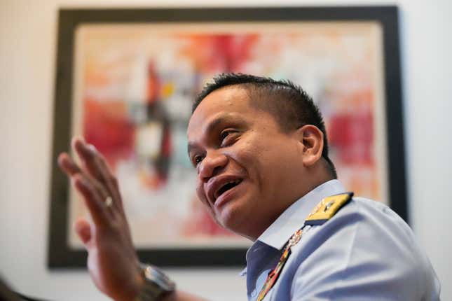 Philippine coast guard spokesman Commodore Jay Tarriela talks to reporters during an interview in Manila, Philippines, on Tuesday, Jan. 23, 2024. A Filipino fishing boat captain said Tuesday that he asserted Philippine sovereign rights in a tense confrontation with Chinese authorities in the disputed South China Sea in a new spat that is testing efforts by Beijing and Manila to deescalate tensions in a potential Asian flashpoint. (AP Photo/Aaron Favila)