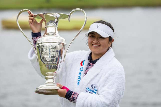 Apr 23, 2023; The Woodlands, Texas, USA;  Lilia Vu (USA) holds the Dinah Shore trophy after winning The Chevron Championship LPGA golf tournament.