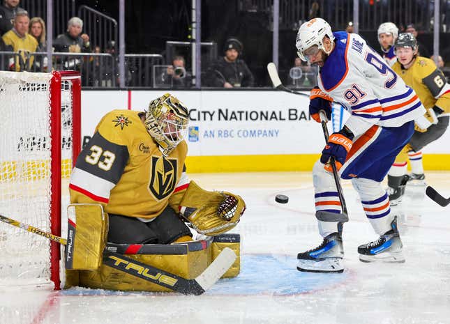 LAS VEGAS, NEVADA - FEBRUARY 06: Adin Hill #33 of the Vegas Golden Knights makes a save against Evander Kane #91 of the Edmonton Oilers in the third period of their game at T-Mobile Arena on February 06, 2024 in Las Vegas, Nevada. (Photo by Ethan Miller/Getty Images)