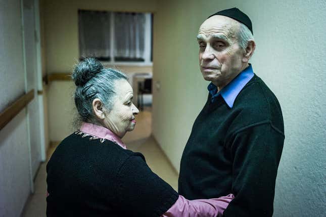 Fira (left) and Lyova (right), from Lugansk, who have been together for 60 years, remember being evacuated to escape the Nazis in World War II.