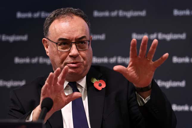 Governor of the Bank of England Andrew Bailey addresses the media during a press conference concerning interest rates, at the Bank of England, in London, Thursday, Nov. 2, 2023. The Bank of England kept its main interest rate unchanged on Thursday at the 15-year high of 5.25% and indicated that borrowing costs will likely remain at these sort of elevated levels for a while, especially if oil and gas prices increase sharply in light of the conflict between Israel and Hamas. (Henry Nicholls/Pool Photo via AP)