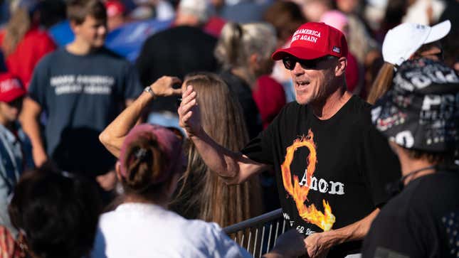 A man in QAnon garb at a Donald Trump rally on September 25, 2021 in Perry, Georgia.