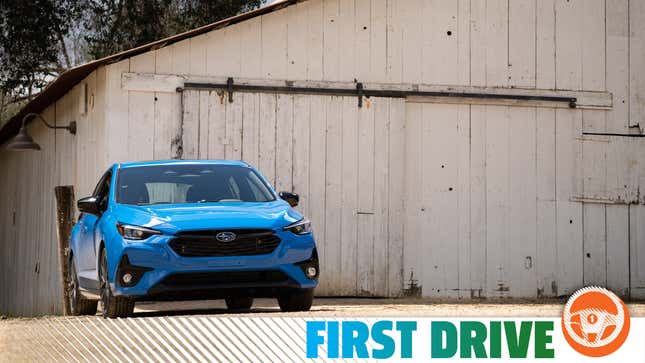 The 2024 Subaru Impreza in Oasis Blue.