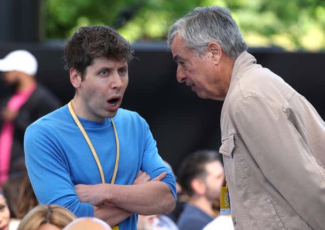 OpenAI CEO Sam Altman (L) talks with Apple senior Vice President of Services Eddy Cue (R) during the Apple Worldwide Developers Conference (WWDC) on June 10, 2024 in Cupertino, California.