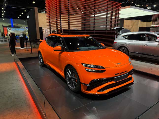 Front 3/4 view of the orange Genesis GV60 Magma concept