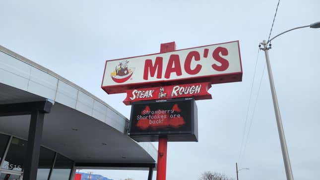 Mac's Steak in the Rough sign