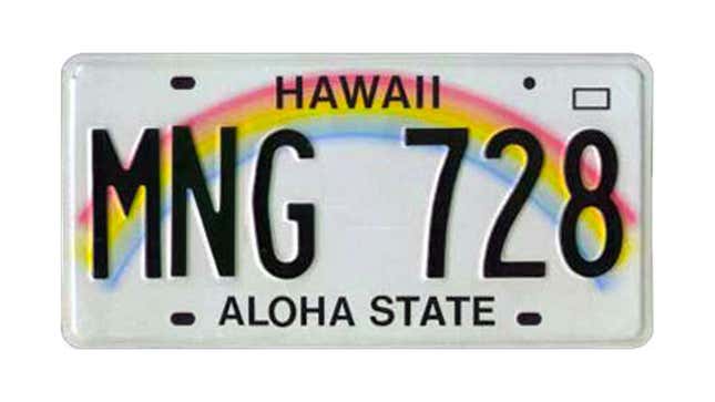 A Hawaii license plate with a rainbow on it. 