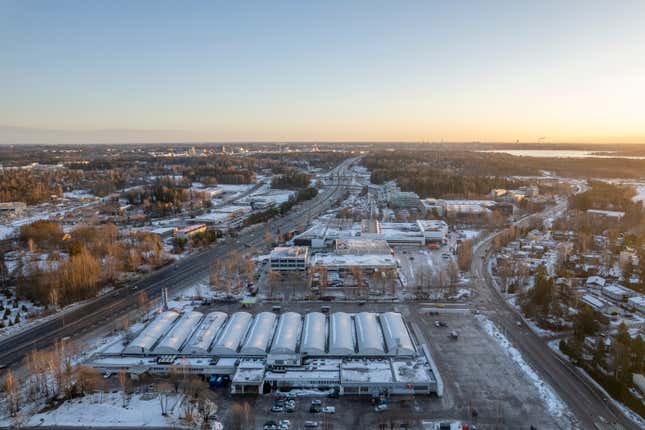 aerial view of a snowy, industrial-looking town