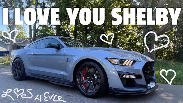 A gray 2022 Ford Shelby GT500 is parked on a driveway with hearts drawn all around it