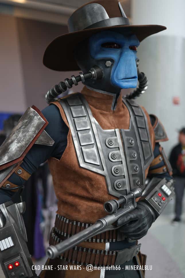 Cad Bane looks off into the distance, gun in hand. 