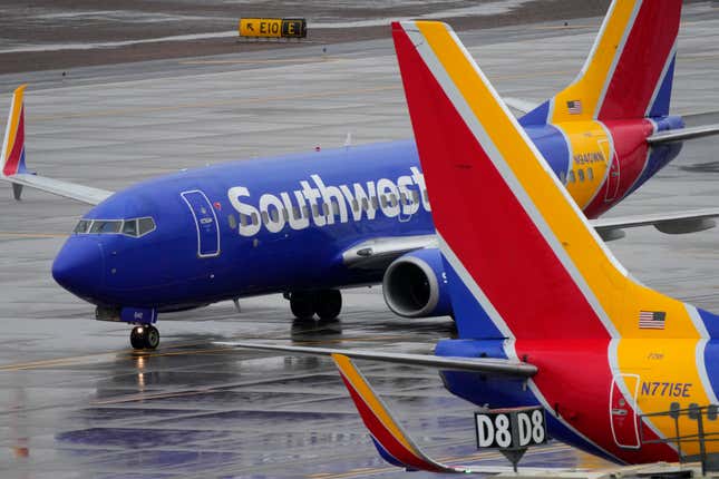 FILE - A Southwest Airlines jet arrives at Sky Harbor International Airport in Phoenix on Dec. 28, 2022. Southwest Airlines announced Wednesday, March 20, 2024, that it has reached a tentative agreement on a new contract with union flight attendants. (AP Photo/Matt York, File)