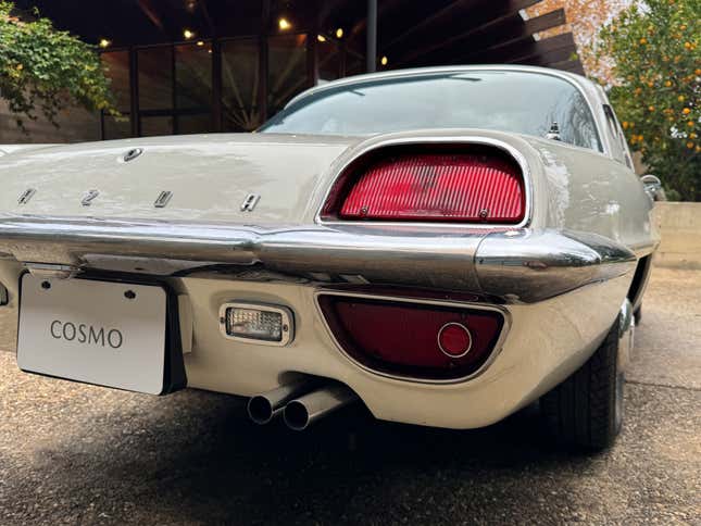 Detail photo of the taillight of a white Mazda Cosmo 110S
