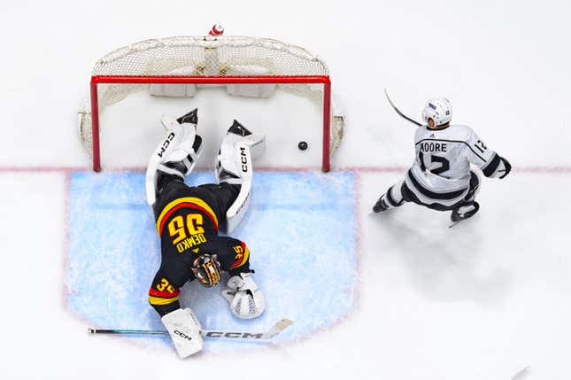 VANCOUVER, CANADA - FEBRUARY 29: Trevor Moore #12 of the Los Angeles Kings scores a goal on Thatcher Demko #35 of the Vancouver Canucks during the third period of their NHL game at Rogers Arena on February 29, 2024 in Vancouver, British Columbia, Canada. (Photo by Derek Cain/Getty Images)