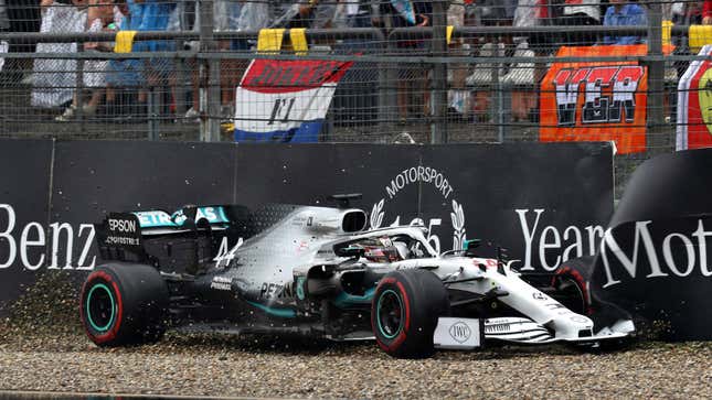 A photo of Lewis Hamilton crashing into a barrier in an F1 race in Germany. 