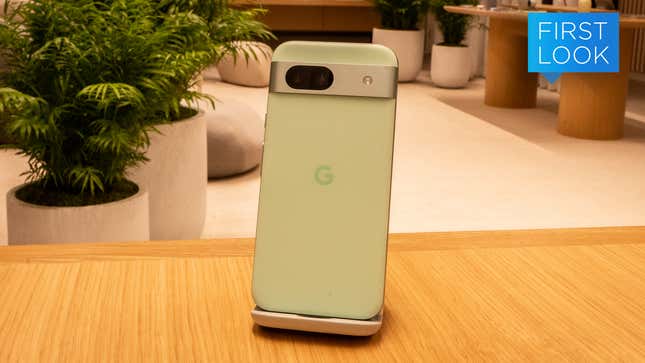 A photo of the Pixel 8a on a Pixel Stand 2