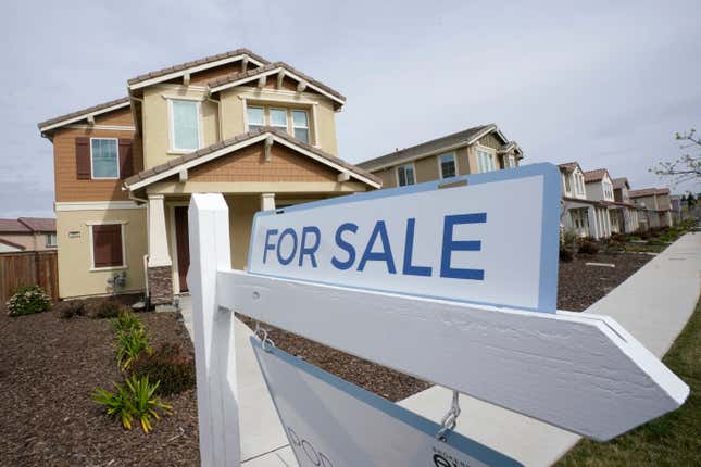 FILE - A &quot;for sale&quot; sign is posted in front of a home in Sacramento, Calif., March 3, 2022. The profit margin on median-priced single-family homes and condos nationally soared to 59% in the July-September 2023 quarter, according to a report released Thursday, Oct. 19, 2023, by real estate information provider Attom. (AP Photo/Rich Pedroncelli, File)