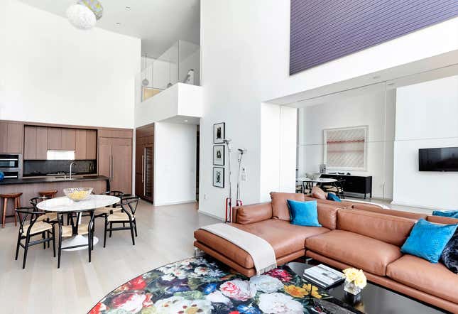 Another view inside the living and kitchen in the Williams’ condo at 50 West.