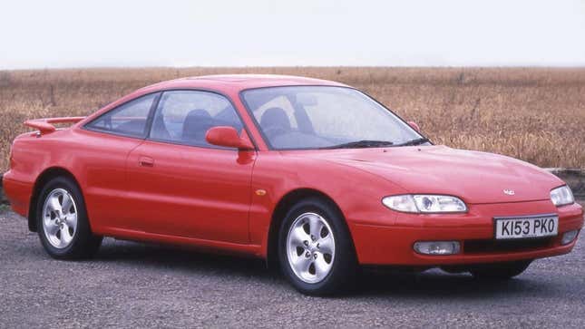 A red Mazda MX-6.