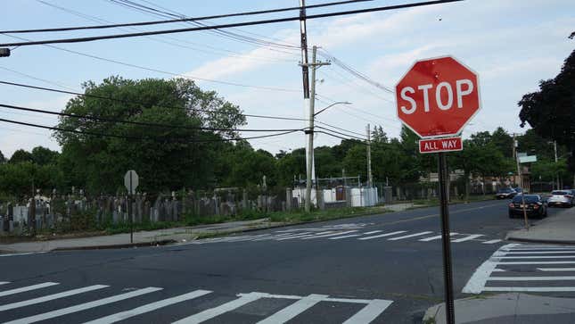 Looking east at the intersection of Pitkin Avenue and 80th Street (Hudson Street) in Ozone Park, Queens.