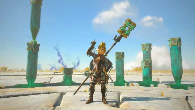 Link stands in front of Zonai Stakes stuck in the ground.