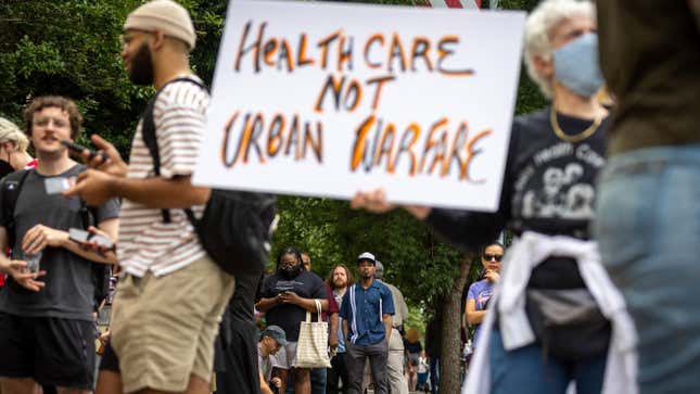 Protesters gather outside Atlanta City Hall ahead of a council vote over whether to approve public funding for the construction of a proposed police and firefighter training center, Monday, June 5, 2023.