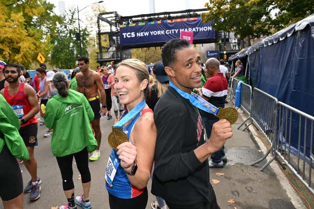 Amy Robach and TJ Holmes run during the 2022 TCS New York City Marathon on November 06, 2022 in New York City.