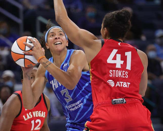 Candace Parker, No. 3 of the Chicago Sky, shoots between Chelsea Gray, No. 12, and Kiah Stokes, No. 41, of the Las Vegas Aces at Wintrust Arena on September 05, 2021 in Chicago, Illinois.