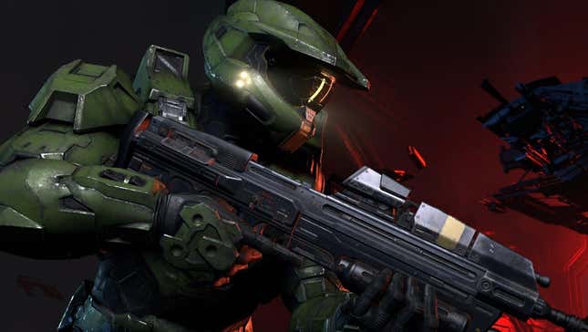 Master Chief holds up his assault rifle as he heads into battle. 