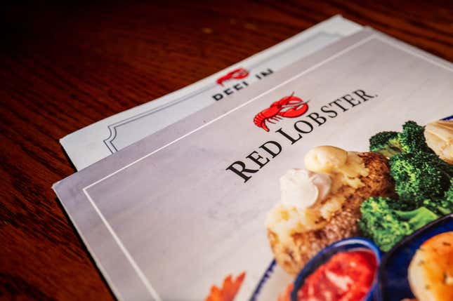 A menu is displayed on a plate at a Red Lobster restaurant in Austin, Texas. 