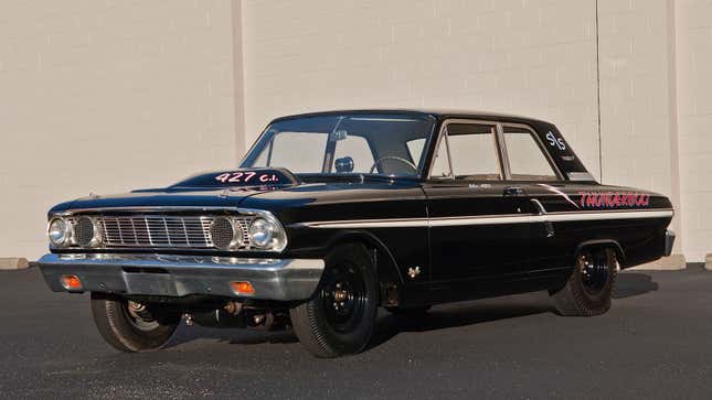 A photo of a black Ford sedan. 