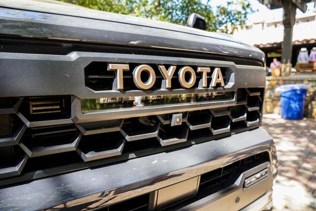 The bronze badge grille on the 2024 Toyota Tacoma Hybrid Trailhunter