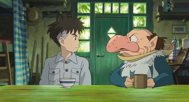 This image released by GKIDS shows Mahito Maki, voiced by Luca Padovan in English and Soma Santoki in Japanese, left, and Grey Heron, voiced by Robert Pattinson in English and Masaki Suda in Japanese, in a scene from Hayao Miyazaki’s “The Boy And The Heron.&quot; (Studio Ghibli/GKIDS via AP)