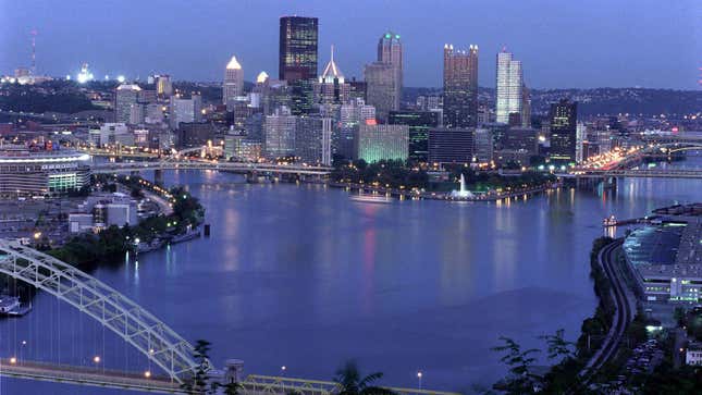 A photo of the Pittsburgh skyline at night. 