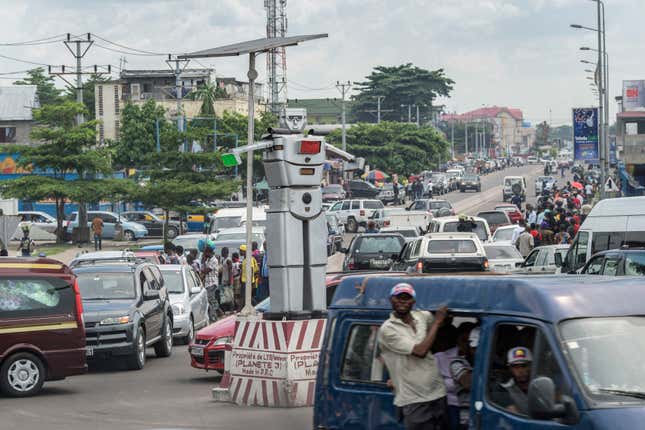 One of the robots at work in a busy intersection.