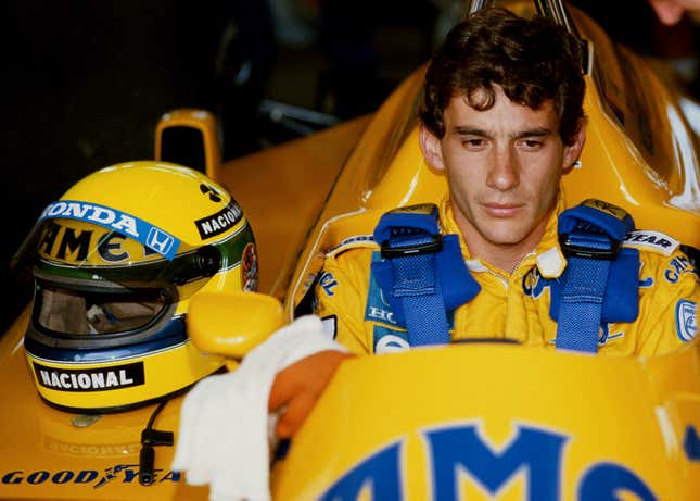 Ayrton Senna of Brazil sits aboard the #12 Camel Team Lotus Honda Lotus 99T Honda RA166E V6 turbo during practice for the Brazilian Grand Prix on 11th April 1987 at the Autodromo Internacional Nelson Piquet Jacarepagua circuit near Rio de Janeiro