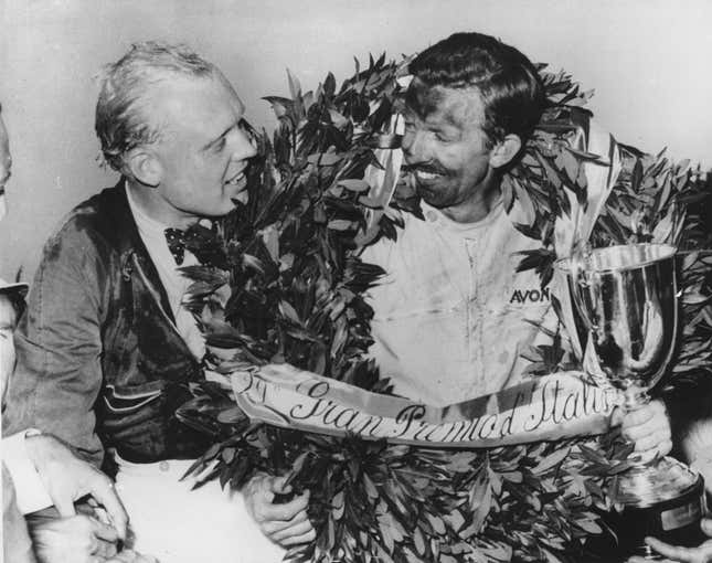 Mike Hawthorn (left) congratulates Tony Brooks (right) on winning the 1958 Italian Grand Prix.