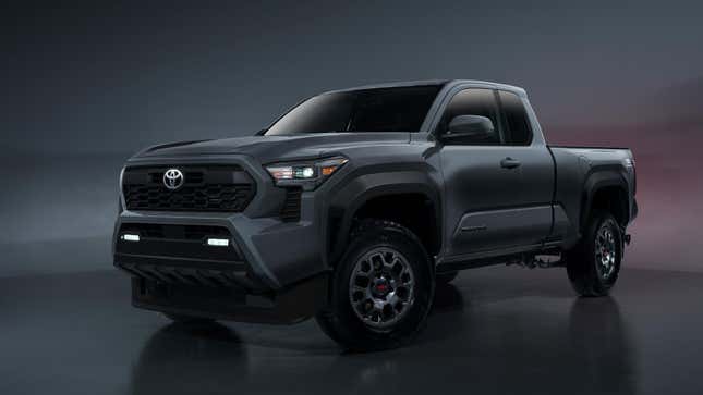 Una foto de estudio de una Toyota Tacoma gris con media cabina