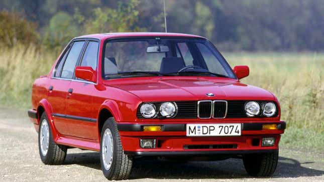 A photo of a red BMW 3 Series sedan. 