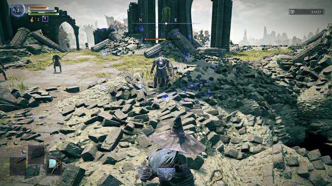 Recluse attacks enemies while standing amongst rubble.