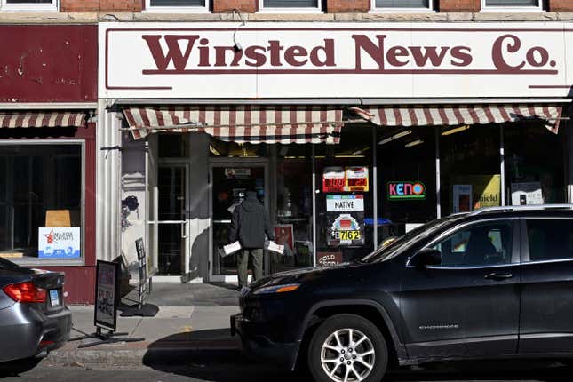 FILE - Andy Thibault, Editor and Publisher of The Winsted Citizen, carries bundles of the paper into the Winsted News Co., Friday, Feb. 3, 2023, in Winsted, Conn. After trying to buck a national trend of media closures and downsizing, the small Connecticut newspaper founded earlier this year with Ralph Nader&#39;s help has succumbed to financial problems and will be shutting down. (AP Photo/Jessica Hill, File)