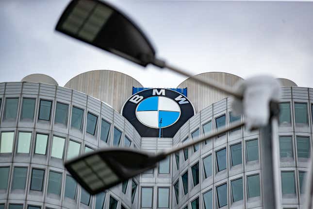 The BMW logo at the BMW tower during German Chancellor Olaf Scholz visits the BMW Group car factory on December 05, 2023 in Munich, Germany. His visit is taking place as Scholz's government wrestles with a federal budget crisis stemming from a recent Federal Constitutional Court ruling