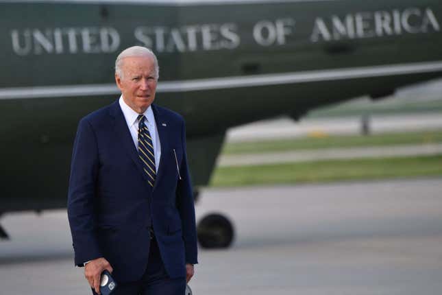 US President Joe Biden looks on after landing at Chicago O’Hare International Airport in Chicago, Illinois, on May 11, 2022, after addressing the International Brotherhood of Electrical Workers International Convention.