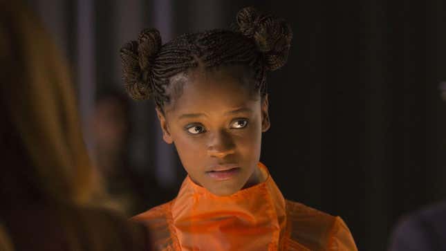 Letitia Wright as Shuri in an orange dress in Avengers: Infinity War.