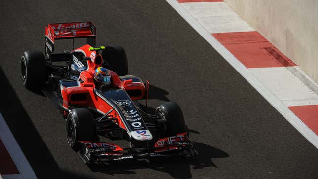 A photo of a black and red Virgin Formula 1 car. 