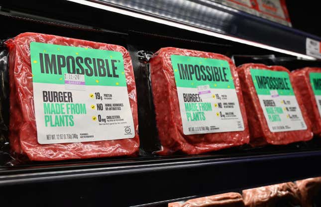 “Impossible Foods” burgers made from plant-based substitutes for meat products sit on a shelf for sale in New York City. 