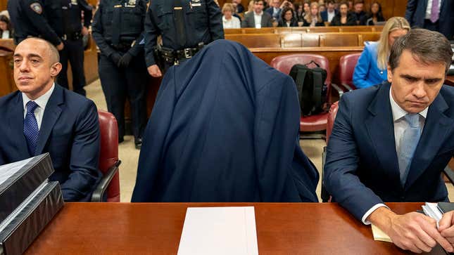 Image for article titled Trump Drapes Jacket Over Head So Nobody Can Tell He’s Sleeping In Court