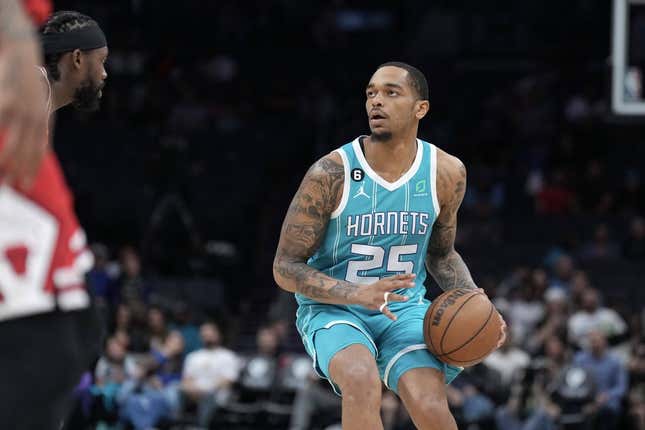 Mar 31, 2023; Charlotte, North Carolina, USA;  Charlotte Hornets forward P.J. Washington (25) looks for the basket in the first quarter against the Chicago Bulls at Spectrum Center.