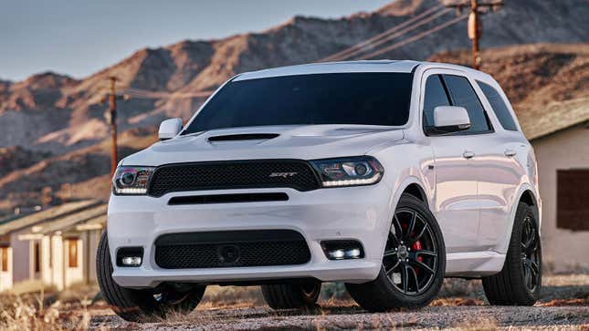 A photo of a white Dodge Durango SUV. 