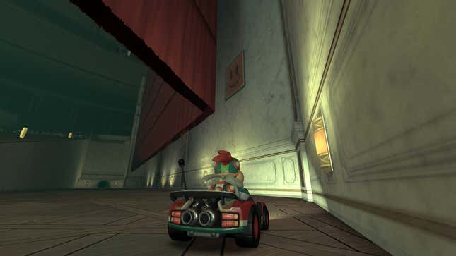 Bowser Jr. sits in a kart in front of a question mark panel.