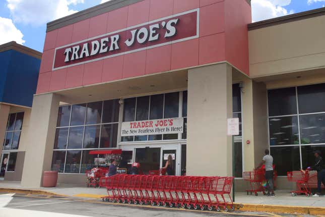 FILE - People stand in line waiting to enter Trader Joe&#39;s to buy groceries in Pembroke Pines, Fla., on March 24, 2020. Don&#39;t count on a favorite store being open on Easter Sunday. Several stores will be closed March 31, 2024, in observance of the holiday. (AP Photo/Brynn Anderson, File)